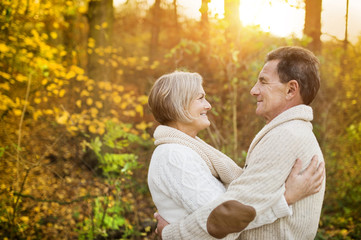 Active seniors taking walk in nature