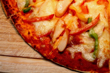 Close-up of pizza on wooden tray