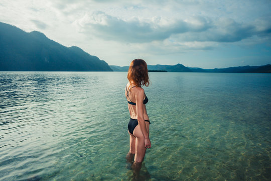 Young woman admiring tropical island