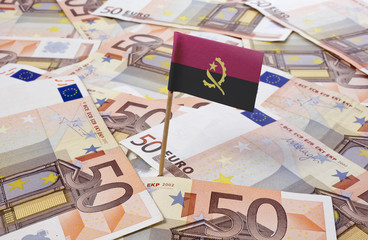 Flag of Angola sticking in 50 Euro banknotes.(series)