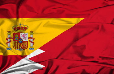 Waving flag of Bahrain and Spain