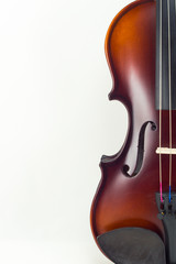 Wooden violin on white background