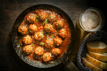 Rustic wholesome lunch of meatballs and beer © exclusive-design