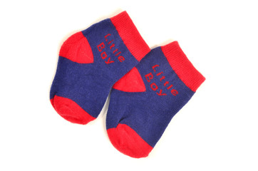 Baby boy socks isolated. Blue and red socks saying little boy.