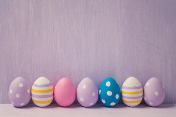 Colorful easter eggs, with space for text. Background