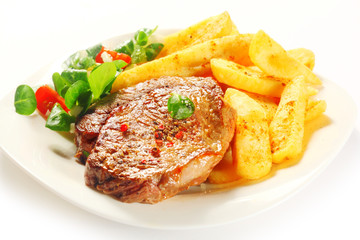 Flavored Grilled Meat with French Fries on Plate