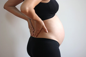 Back pain on woman pregnant