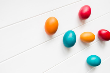 Easter eggs arrangement with copy space on wodden background