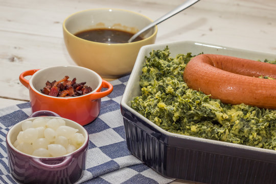 Typical dutch dish boerenkool with pickled onions