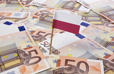 Flag of Poland sticking in 50 Euro banknotes.(series)