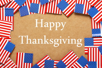 Fototapeta na wymiar Happy Thanksgiving Day text with USA flags border