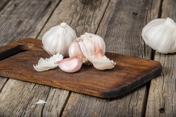 Garlic on wooden background