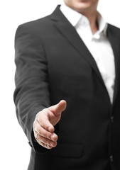 the businessman acting shake hand on white background