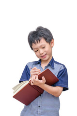 Asian boy with book on head thinking over white background