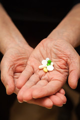 palm with multicolored pills