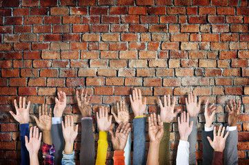 Group of Diverse Casual People's Hands Raised Concept