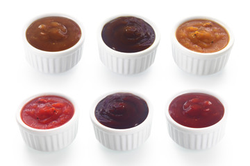 Assorted Rub and Marinade Sauce on White Saucers