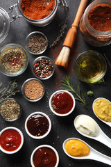 Assorted Seed Type Spices and Sauces on the Table