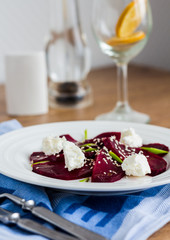 roasted beet salad with goat cheese and sesame seeds, snack