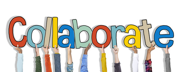 Diverse Hands Holding The Word Collaborate Concept