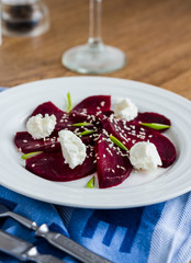 roasted beet salad with goat cheese and sesame seeds, snack