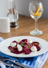 roasted beet salad with goat cheese and sesame seeds, snack