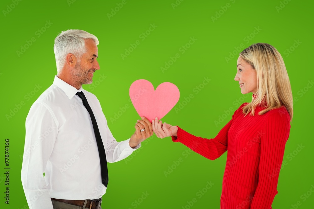 Poster composite image of handsome man getting a heart card form wife