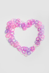 Colorful heart made of rubber bands