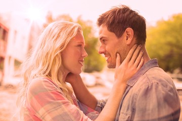 Fototapeta premium Hip young couple smiling at each other