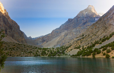 Fototapeta na wymiar blue mountain lake at sunset