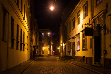 Night street in Riga under the bright lights in the autumn