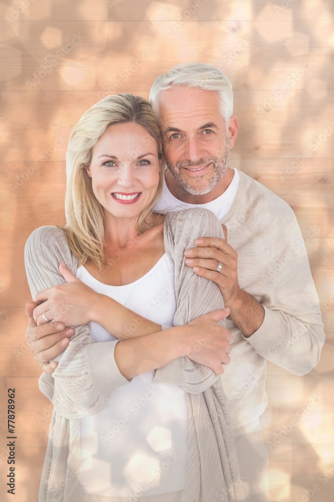 Aufkleber composite image of happy couple standing and hugging