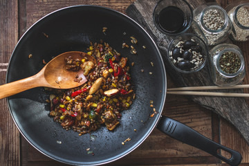 Indian vegetarian fried rice with vegetables and hazelnuts