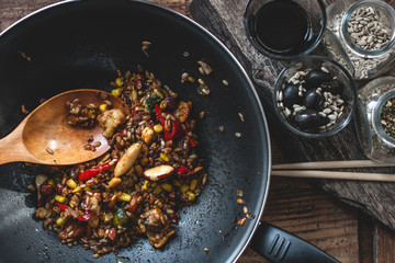 Indian vegetarian fried rice with vegetables and hazelnuts
