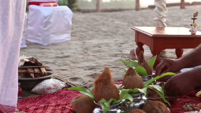 hindu brahmins preparing the place for Indian wedding ceremony w