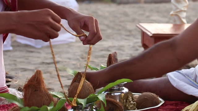 hindu brahmins preparing the place for Indian wedding ceremony w