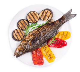 Grilled fish with vegetables.
