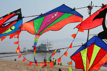 Multicolor kites on a background of Yangtze river, Wuhan, China