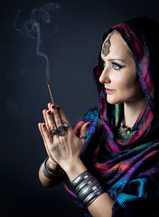 Fototapeta premium Woman with incense