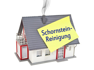 Haus mit Zettel und Schornsteinreinigung