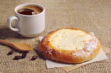 Pie with cottage cheese and coffee cup