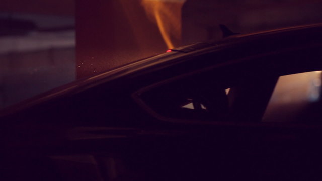 Incredible backlight illuminates the car in parking lot