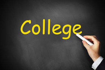 hand writing college on black chalkboard
