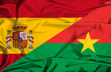 Waving flag of Burkina Faso and Spain
