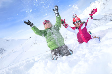 Kids having fun playing in the snow