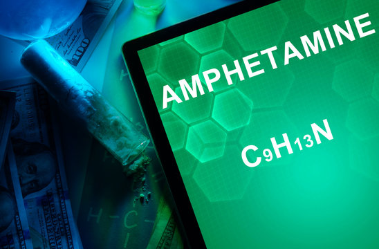 Tablet with the chemical formula of Amphetamine.