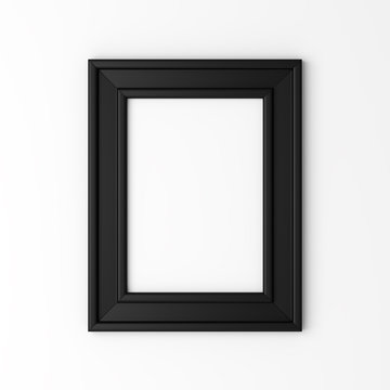 blank black photo frame on white wall