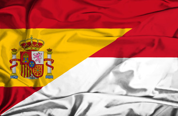 Waving flag of Indonesia and Spain