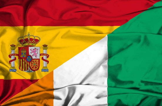 Waving flag of Ivory Coast and Spain