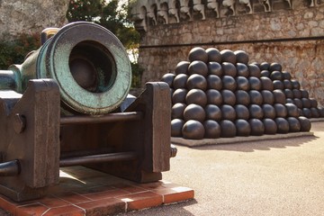 Elements of antique cannon and balls in Monte Carlo, Monaco